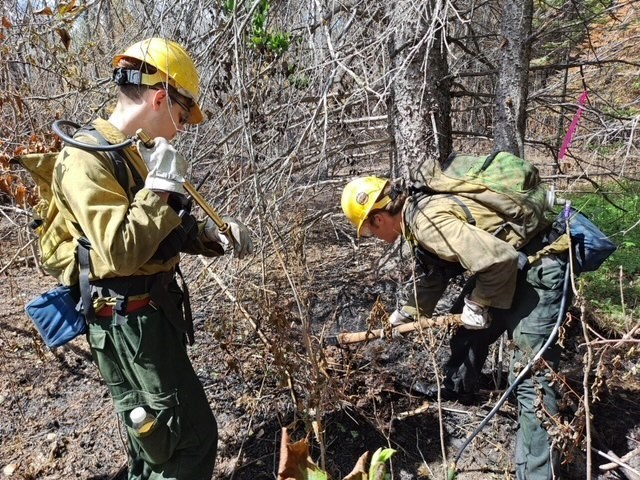 Crew members with gear