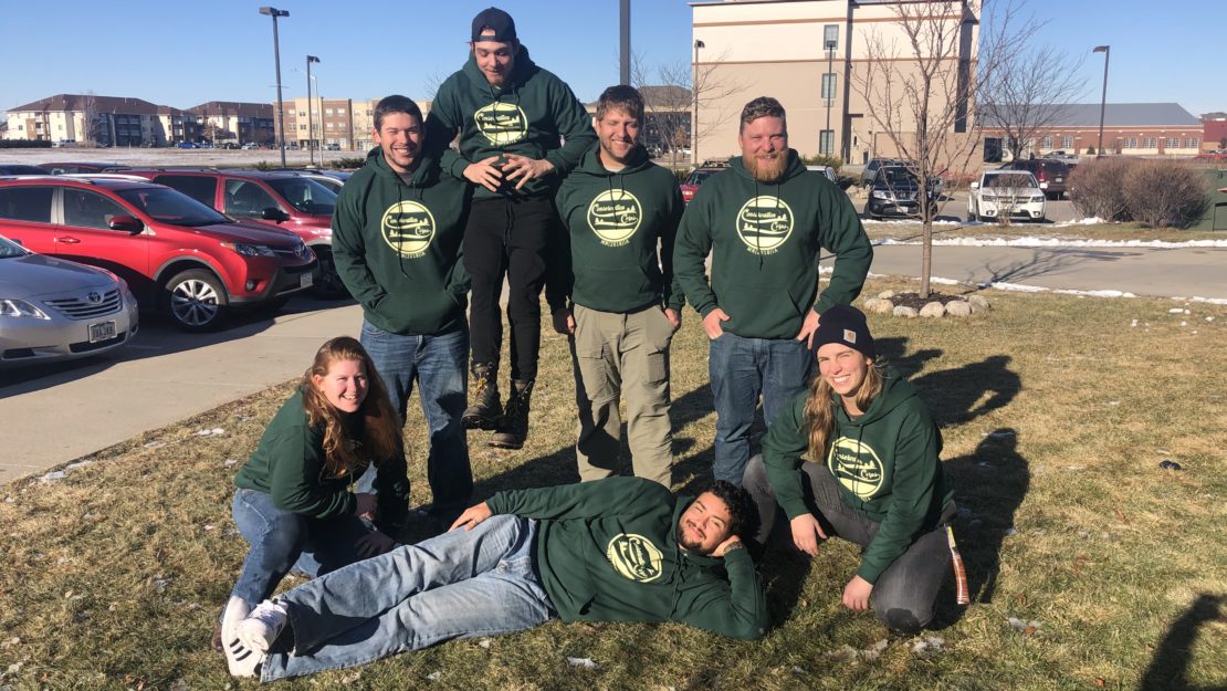 group of members in matching hoodies