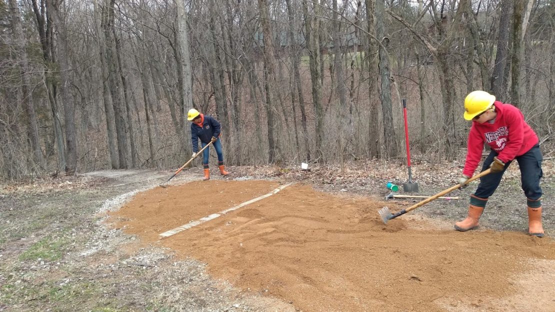 Two crew members doing trail work