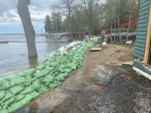 sandbags holding back water