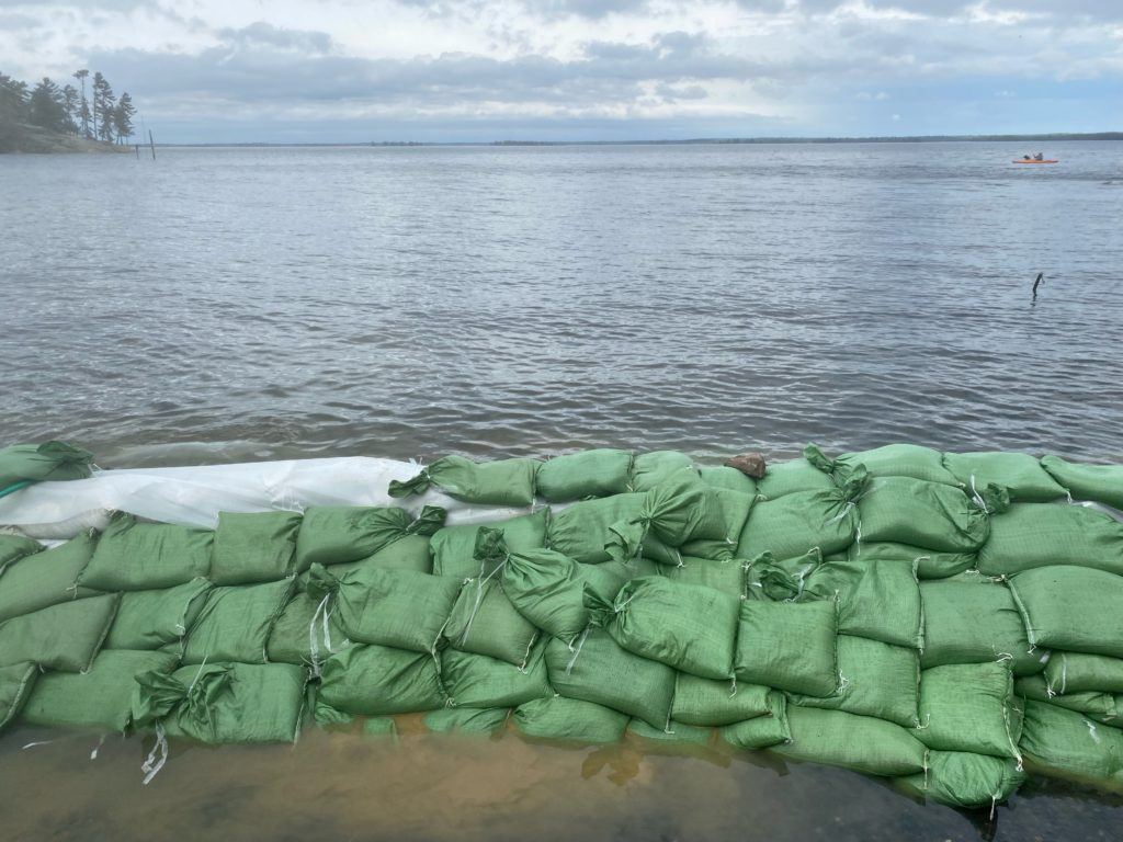 sandbags holding back water