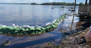 sandbags on waters edge