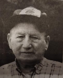 old photograph of man in cap