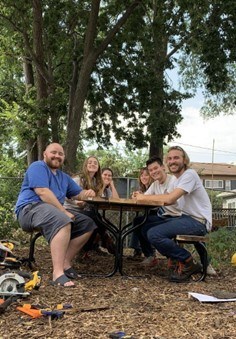 sitting at picnic table