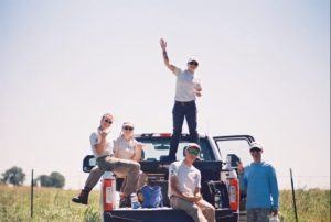 crew on back of a truck