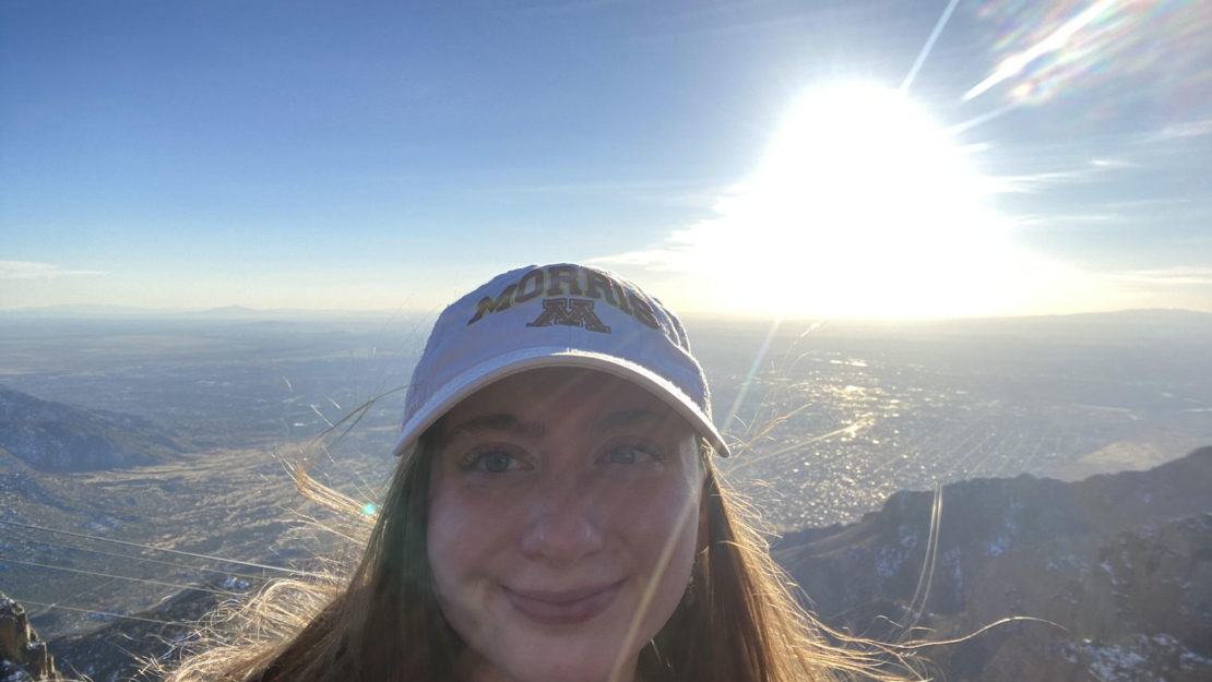 Woman on a mountain top