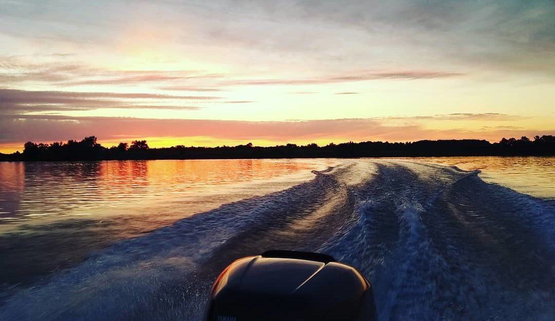 Boating at sunrise