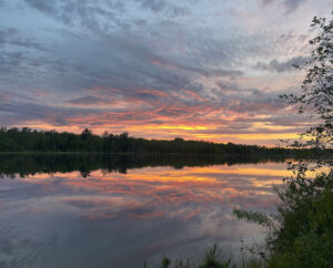 A sunset over a lake