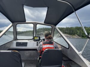 A person driving a boat